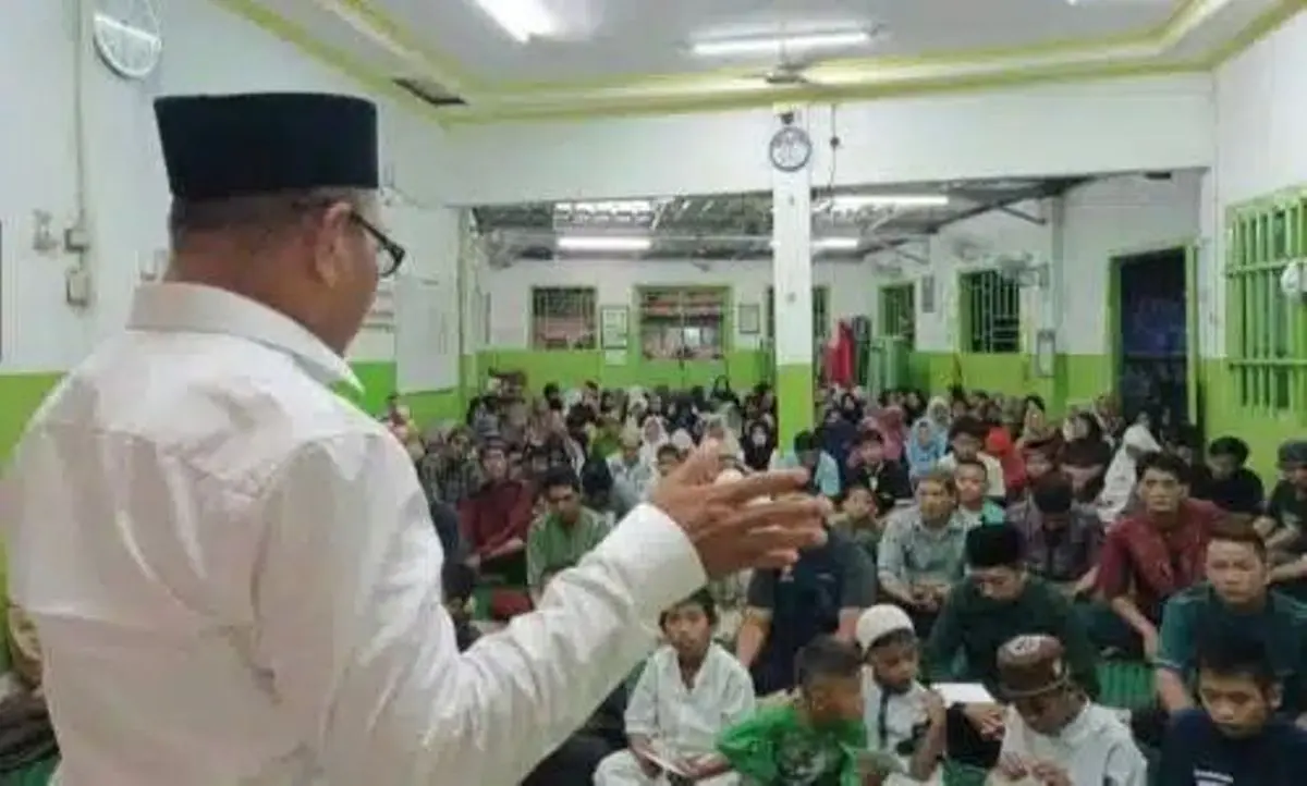 Anggota DPRD Sumsel, M. Toha, menggelar acara santunan dan buka puasa bersama di Kelurahan 24 Ilir, Kecamatan Bukit Kecil, Palembang, pada hari Selasa, tanggal 17 Maret 2026. (WARTANEGERIKU.ID/FRAN)