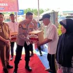 Polres Banyuasin sambang kamtibmas dan salurkan bantuan sosial di Air Kumbang