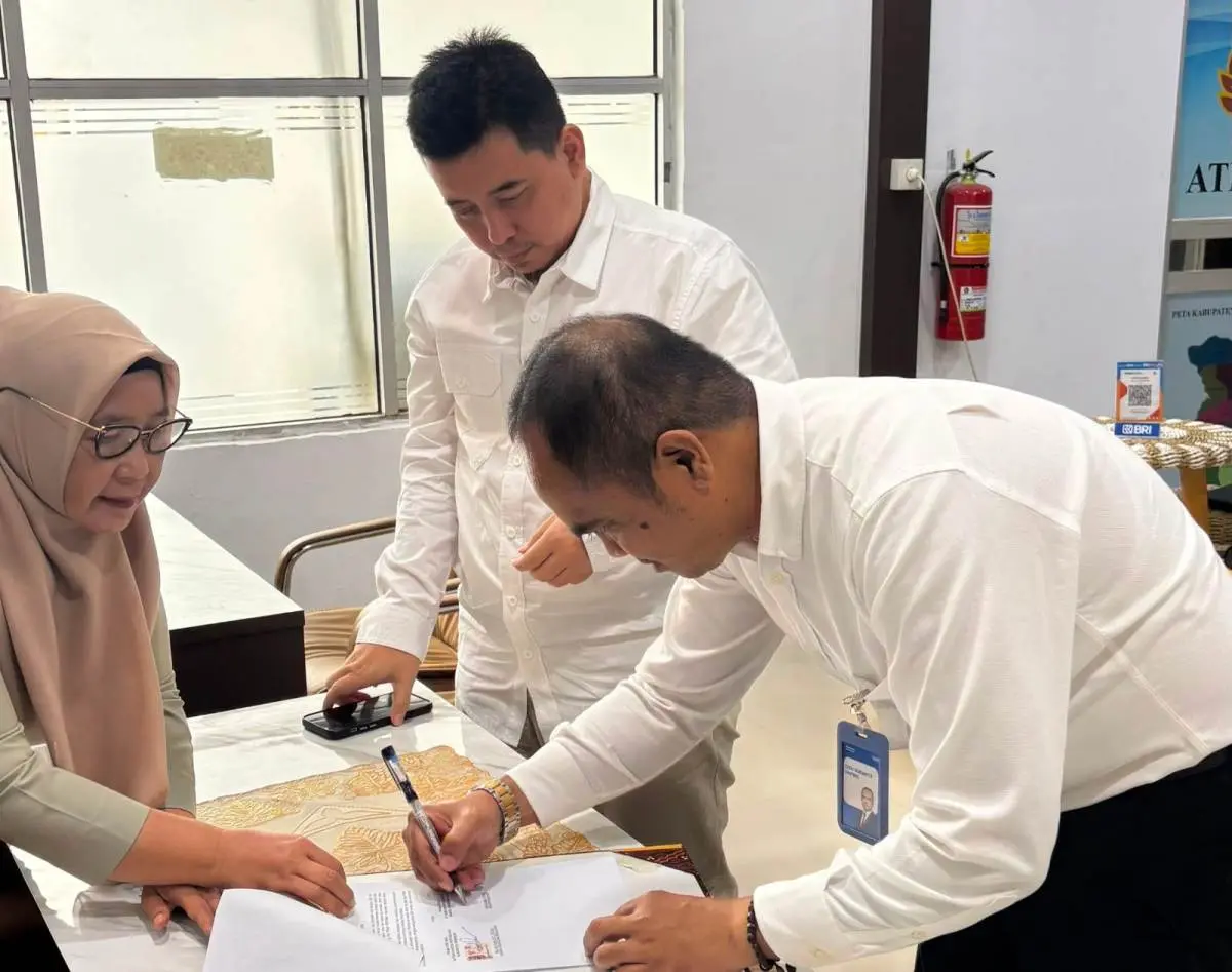 Kantor Pertanahan (Kantah) Kabupaten Merangin resmi menjalin kerja sama dengan PT Bank Rakyat Indonesia (Persero) Tbk Kantor Cabang Bangko. (WARTANEGERIKU.ID/TRI)